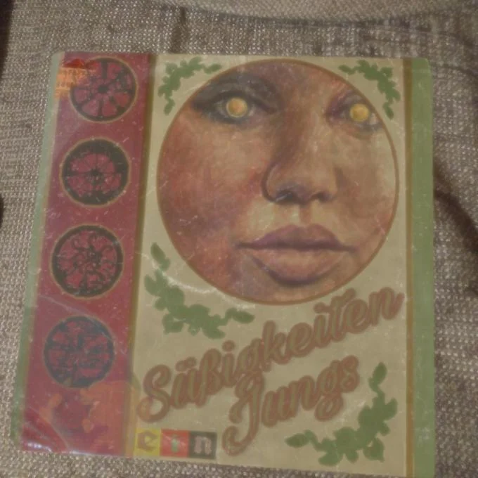 Vintage record sleeve artifact from investigation.