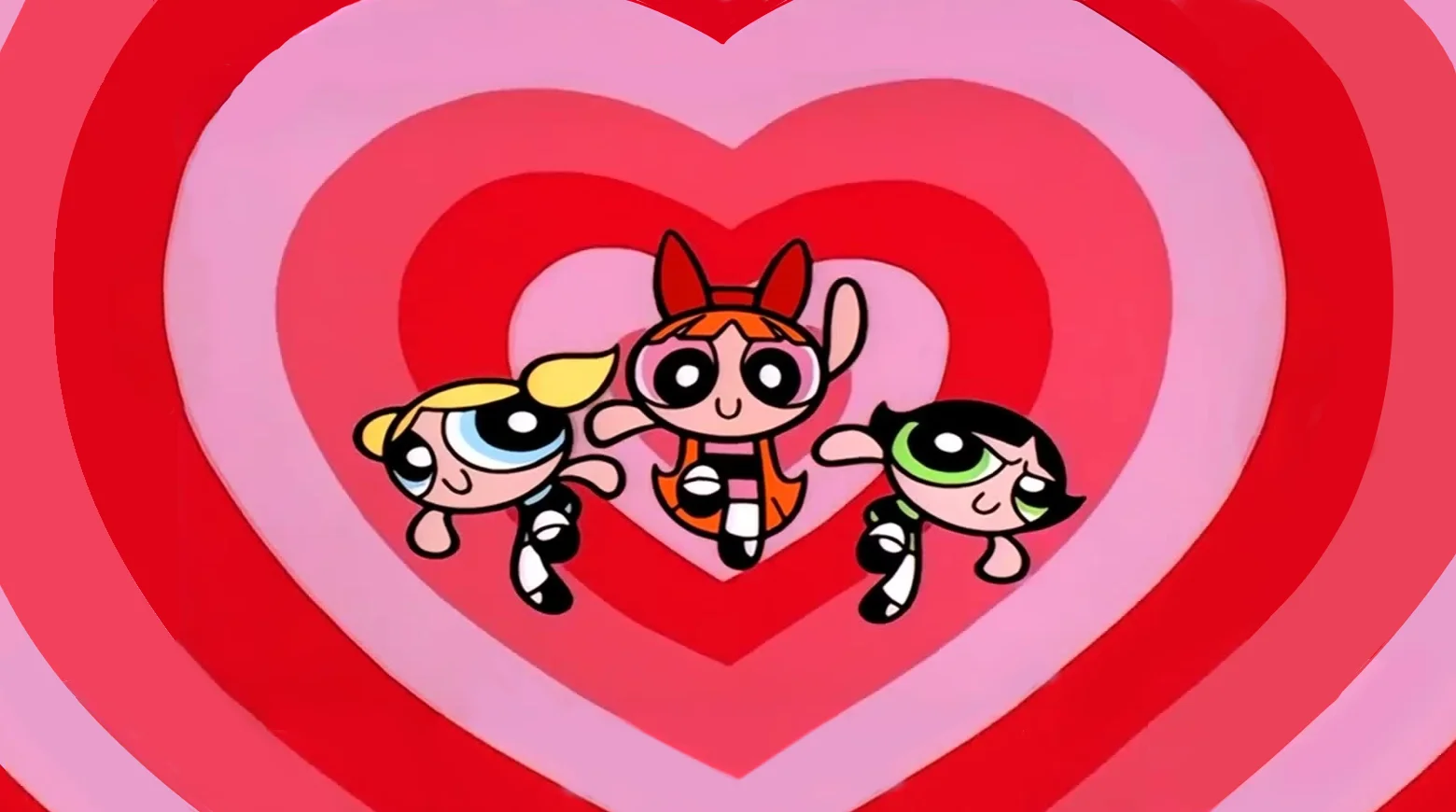 The signature title-sequence shot of the three Powerpuff Girls — Blossom, Bubbles, and Buttercup — in front of the show's recognizable heart background.
