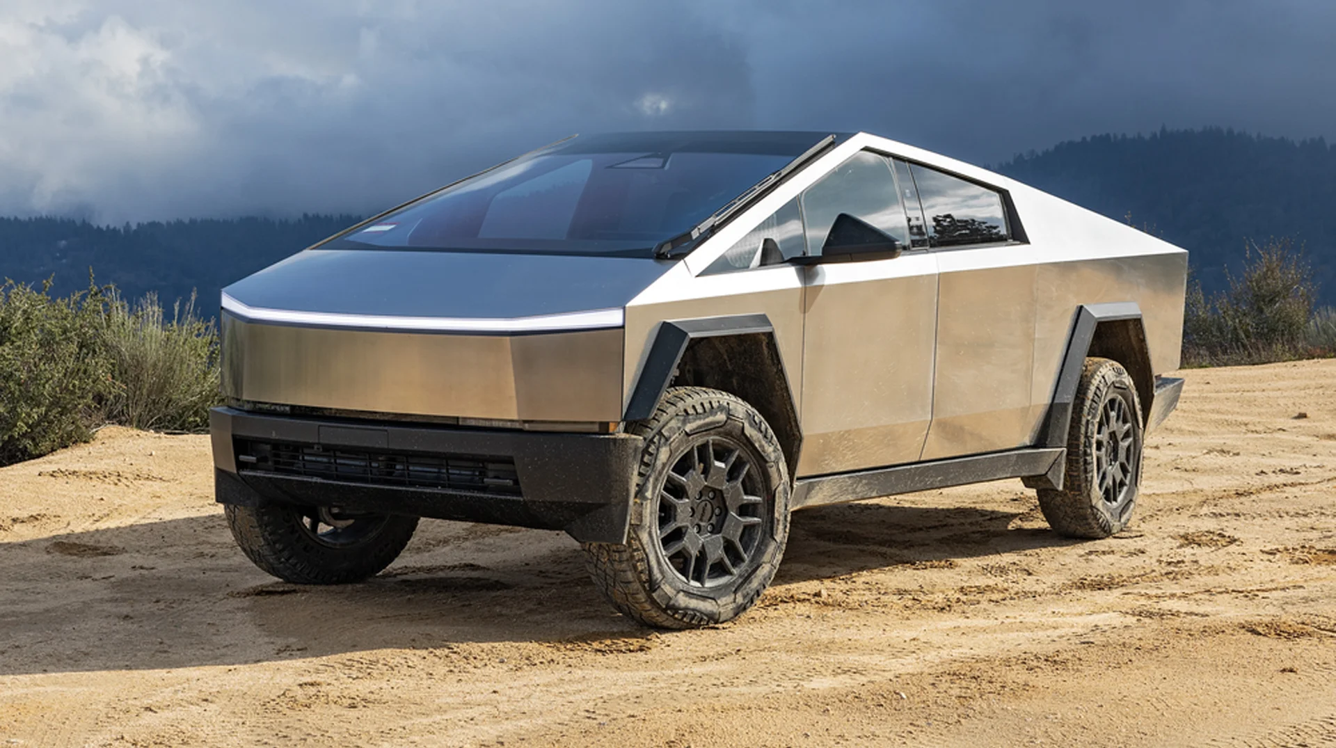 The Tesla Cybertruck, an all-electric, battery-powered light-duty truck unveiled by Tesla, Inc., featuring its signature angular stainless-steel exoskeleton design.