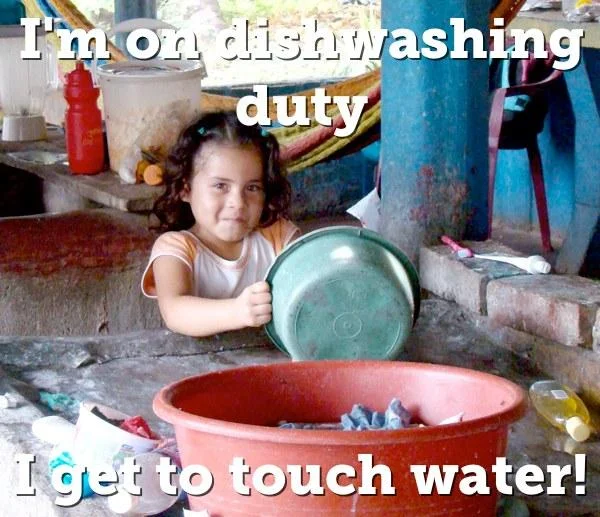 A companion variant of the Third World Success meme featuring a girl finding joy in household chores.