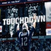 Brady with TOUCHDOWN scoreboard graphic.