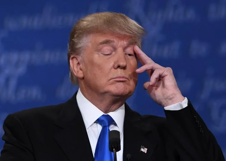 A screenshot of Donald Trump during the first 2016 presidential debate, where his repeated sniffing and face-touching became the subject of widespread speculation and the Trump Sniffles meme.
