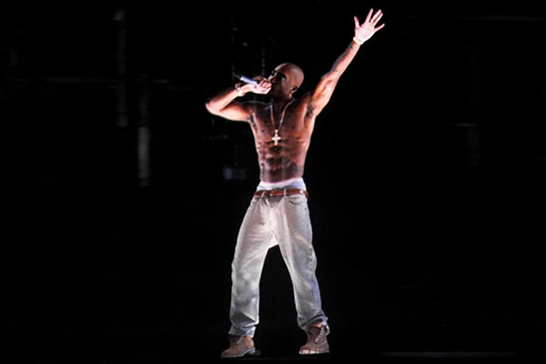 The Tupac Shakur hologram performs during Dr. Dre and Snoop Dogg's headlining set at Coachella 2012.