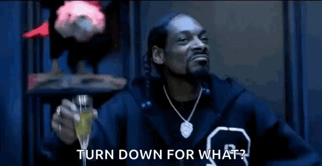Music video moment with catchphrase caption.