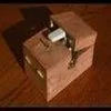 Iconic useless box turning itself off.