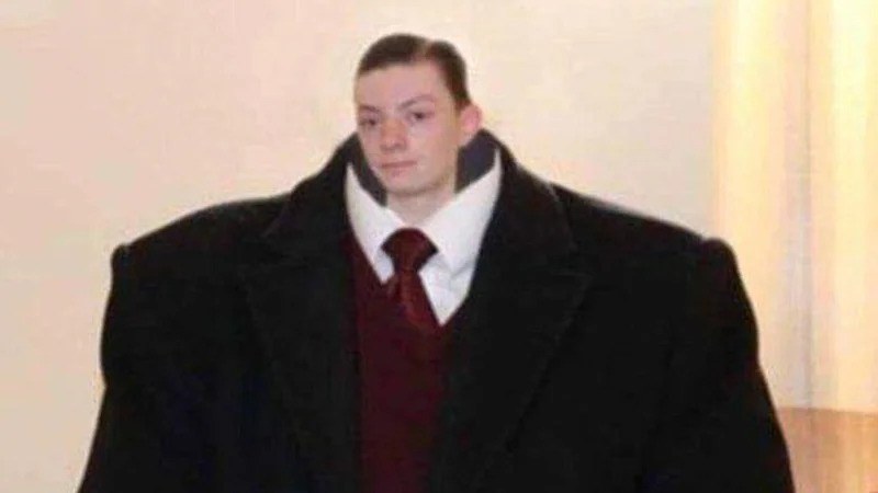 The widely circulated ReviewBrah photograph commonly used to illustrate the disproportionate 'big top, small bottom' visual joke of accidentally holding Shift while Caps Lock is on.