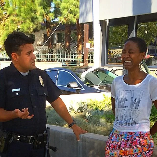 Actress Danièle Watts being detained by LAPD in 2014, an incident widely cited alongside 'walking while black' discussions of racial profiling.