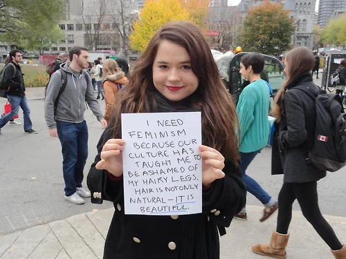 Sign about body image and cultural pressures.
