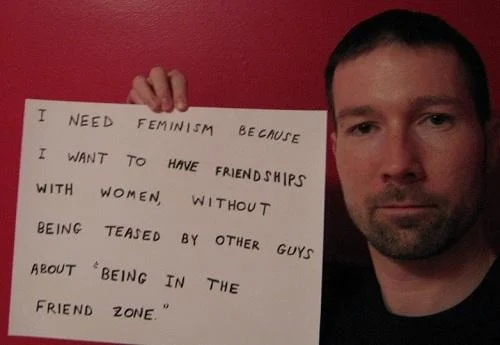 Male participant supporting feminist movement.