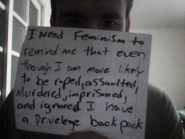 Sign addressing systemic violence against women.
