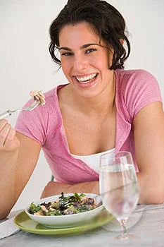 Women Laughing Alone With Salad