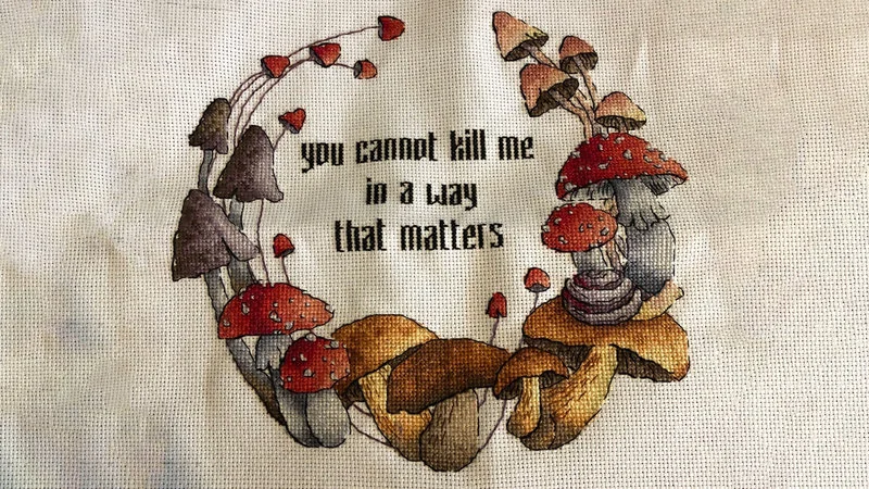 Handcrafted textile meme transformation.