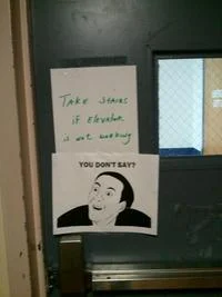 Printed meme poster photograph.