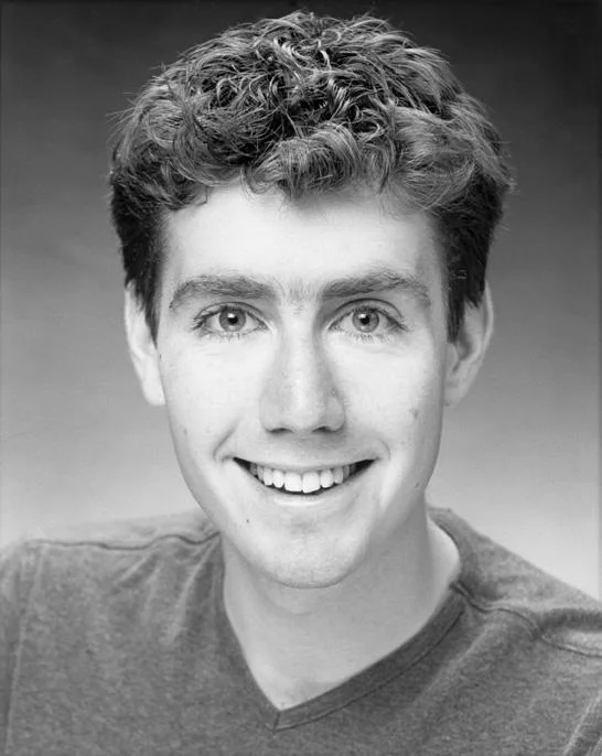 Headshot of Brett Ambler, the actor who starred in the original Kazoo Kid video that spawned the meme.