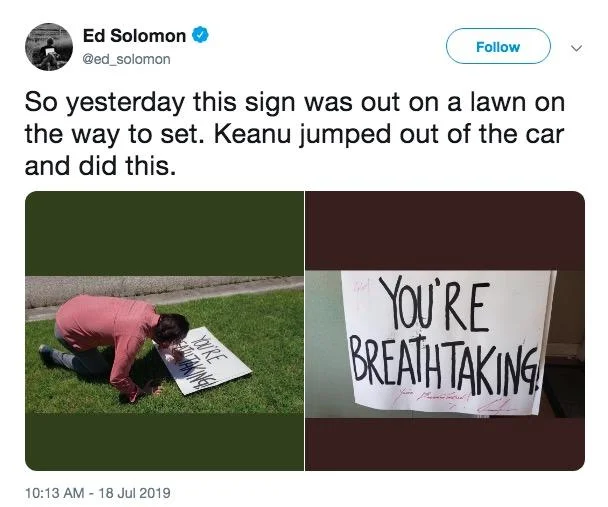 Ed Solomon's July 2019 tweet documenting Keanu Reeves stopping to sign a fan's 'You're Breathtaking' sign, extending the meme into real life.