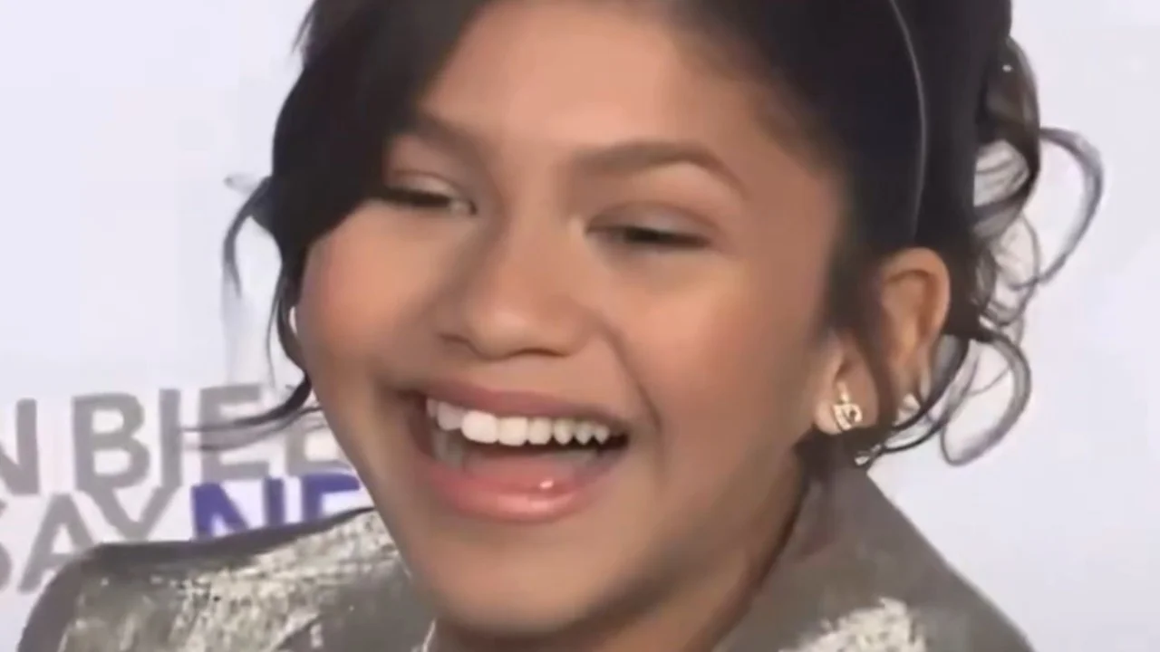 Zendaya caught mid-laugh at the 2011 Justin Bieber: Never Say Never premiere, the still that spawned the viral reaction meme.